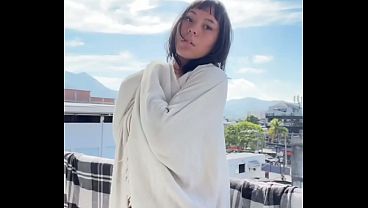 Hot Amateur Bares Massive Natural Tits on Balcony Outdoors